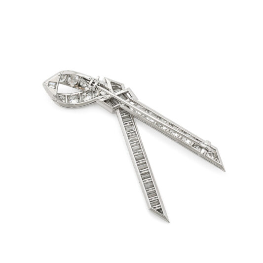 back view of diamond and platinum ribbon brooch