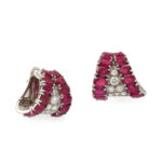 other view of Cartier ruby and diamond earrings, including a three quarter view to illustrate backing