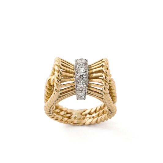 other view of gold and diamond bow basketweave ring