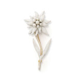 gold and white enamel edelweiss flower brooch with center cluster of natural pearls