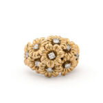 aerial view of gold and diamond daisy cluster ring