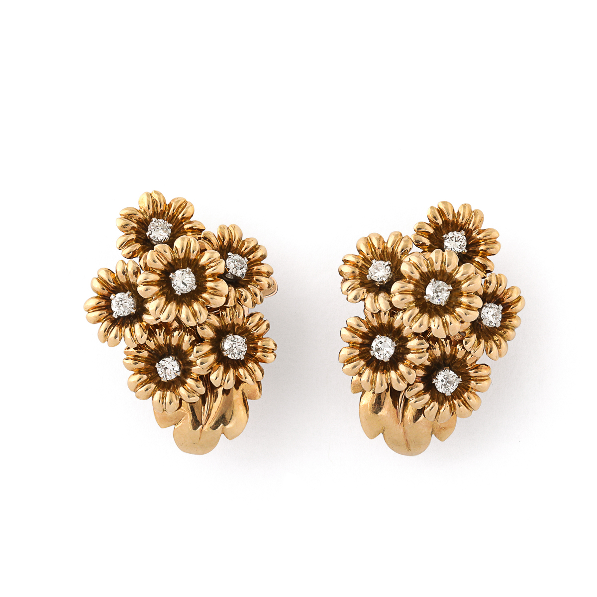 Gold and diamond daisy cluster earrings, each with six flowers