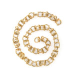 18k gold necklace of alternating circles photographed in a spiral