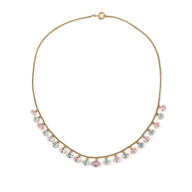 15k gold necklace decorated with a fringe of alternating cushion-cut aquamarines and pink topaz