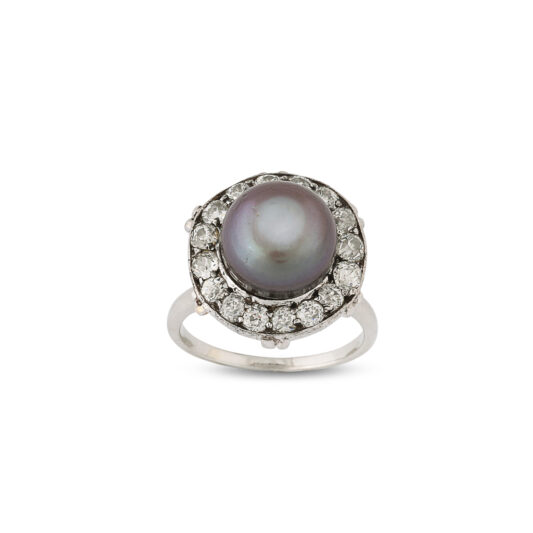 aerial view of black button pearl and diamond ring showing more of the platinum shank