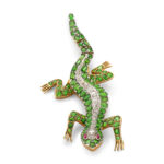 demantoid (green) garnet and diamond salamander brooch set in platinum and gold with ruby eyes and articulated tail