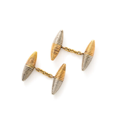 other view of gold and platinum tubular cufflinks, illustrated further apart to show the chain connecting them