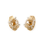 Gold wirework scroll earrings set with a ring of diamonds