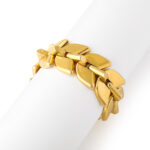 gold herringbone bracelet photographed on bracelet roll