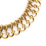 detail view of gold wirework chain necklace