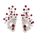 Burma ruby and brilliant and baguette cut diamond scroll design clips terminating in fanciful spray or plumage design