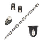 Blackened steel, diamond, and cultured pearl suite comprising earrings, ring, bracelet, and clip