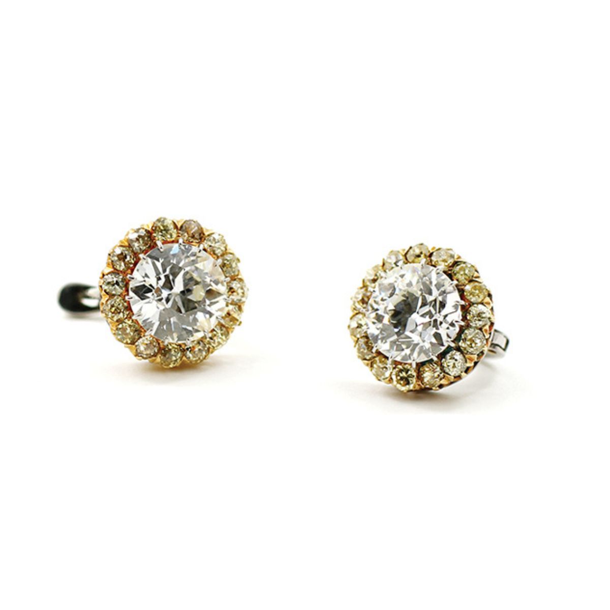 old mine diamond cluster earrings, the central diamond of each surrounded by natural yellow diamonds