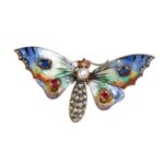butterfly brooch with multi-colored wings set with sapphires and rubies and diamond body