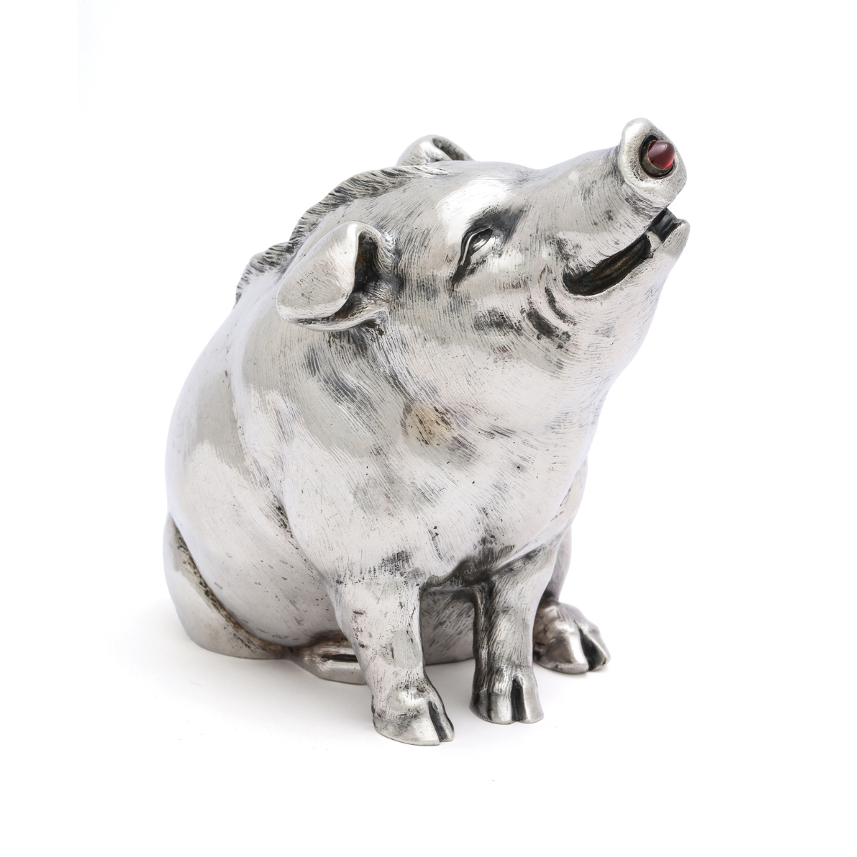 Silver bellpush in the form of a pig with a garnet nose as a pushpiece