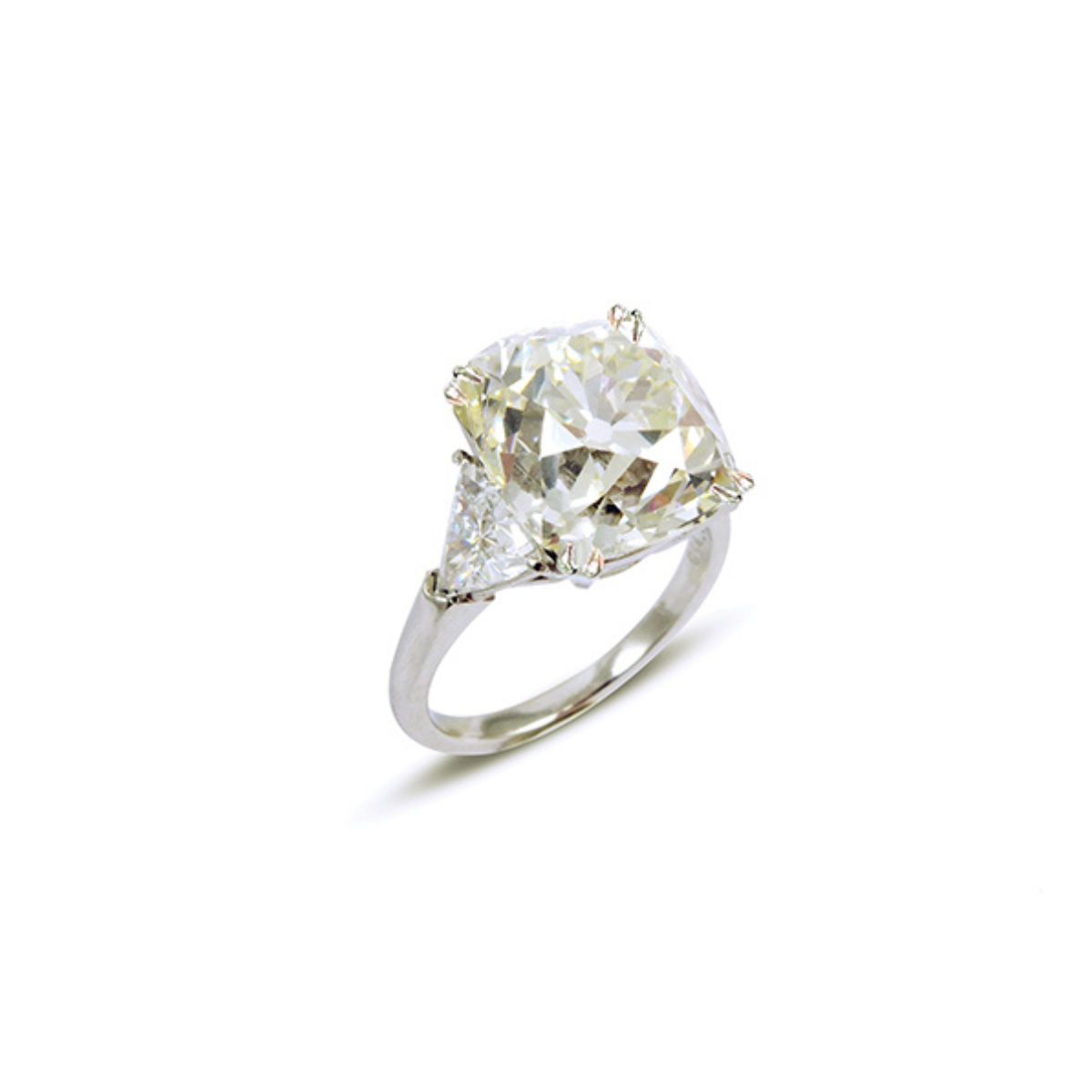 three quarter view of old-mine brilliant-cut diamond ring with triangular-cut diamond shoulders