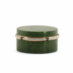 nephrite and white enamel circular box set with rubies