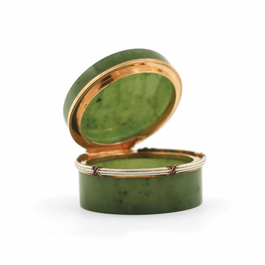 nephrite and white enamel circular box set with rubies, open